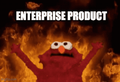 Elmo Is Standing In Front Of A Fire With The Words Enterprise Product Written Below Him GIF