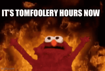 Elmo Is Standing In Front Of A Fire With The Words " It 'S Tomfoolery Hours Now " GIF