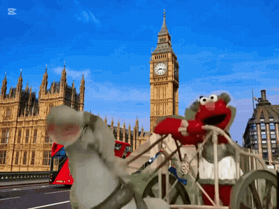 Elmo Riding Carriage In Front Of Big Ben London GIF