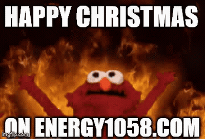 Elmo Says Happy Christmas on Energy1058.com Burning Background