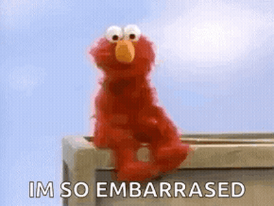 Elmo Sitting Embarrassed GIF