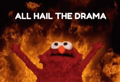 Elmo Standing In Front Of Fire GIF