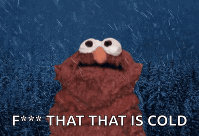 Elmo Standing In Rain Saying That That Is Cold GIF