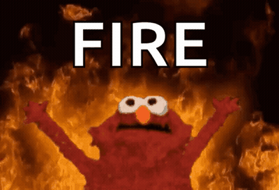 Elmo Surrounded By Flames Saying Fire GIF