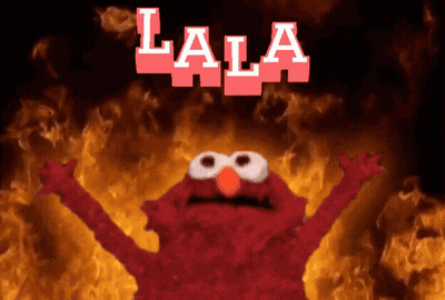 Elmo With Flames Behind Him Saying Lala GIF