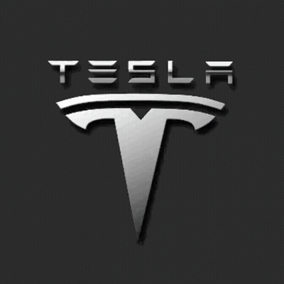 Elon Musk Is Smiling In Front Of A Tesla Logo GIF