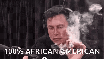 Elon Musk Is Smoking A Cigarette In Front Of A Microphone . GIF