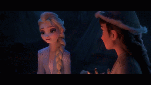 Elsa And Anna From The Movie Frozen Are Looking At Each Other GIF