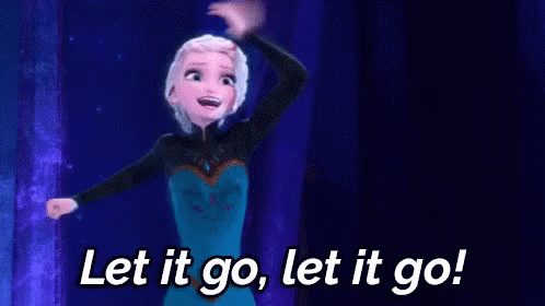 Elsa From Frozen Is Dancing In The Dark And Saying `` Let It Go , Let It Go '' . GIF