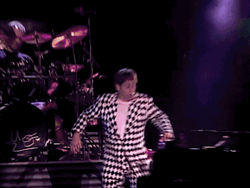 Elton John Lying Down On Piano GIF