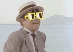 Elton John Wearing Different Eyeglasses GIF