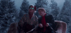 Elton John With Ed Sheeran On Sleigh GIF