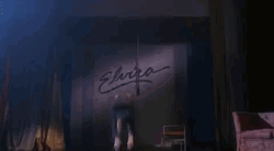 Elvira Doing A Backflip GIF