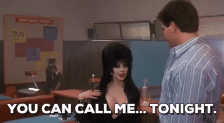 Elvira Talking To A Bob Redding GIF