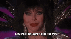 Elvira Winking Unpleasant Dreams GIF