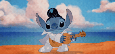 Elvis Cartoon Playing Guitar On Beach GIF