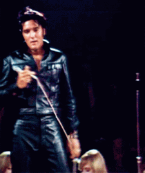 Elvis Lovely Smile On Stage Leather Suit GIF