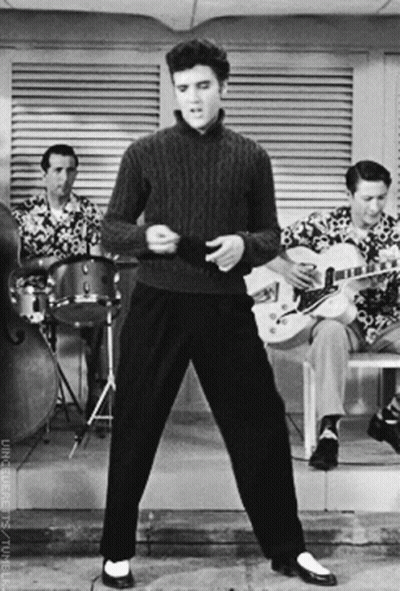 Elvis Presley Is Dancing In Front Of A Band GIF