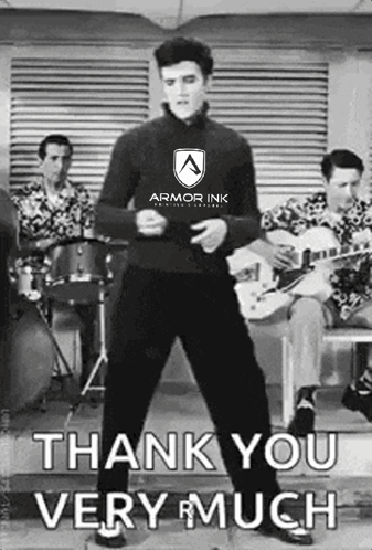 Elvis Presley Is Wearing An Armor Ink Shirt And Is Dancing In Front Of A Band GIF