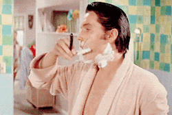 Elvis Presley Seriously Shaving GIF