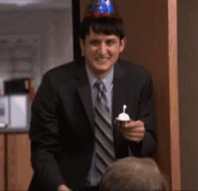 Elvis Presley Singing Into Microphone In White Suit GIF