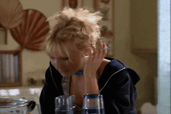 Embarrassed Blonde Girl Smoking GIF
