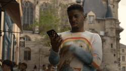 Emily In Paris Answering Phone Call GIF
