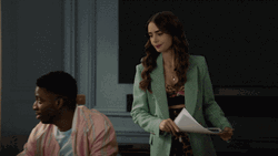 Emily In Paris Hit Someone's Face With Paper GIF