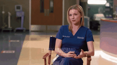 Emily Vancamp Sits In Chair In Hospital Room GIF