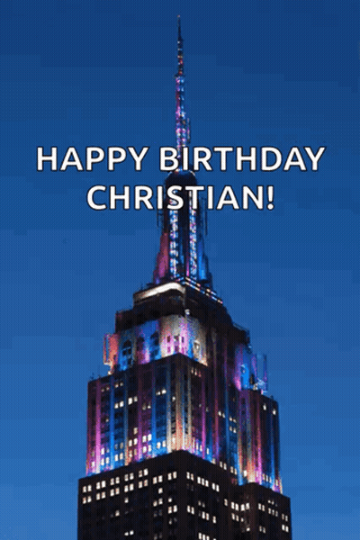 Empire State Building Lit Up Purple And Blue GIF