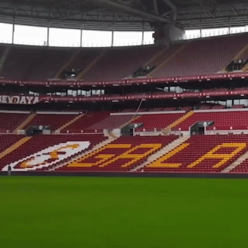 Empty Stadium With Red Seats And Yellow Letters Tasa GIF