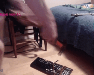 Enraged Lady Mc Hammer Pounding Computer  GIF