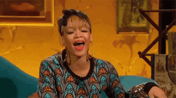 Entertaining Rihanna Funny Winking GIF