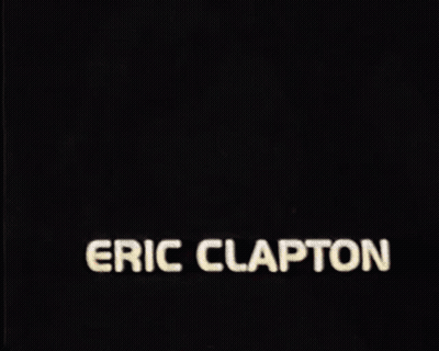 Eric Clapton 'S Face Is Shown In A Black And Red Background GIF