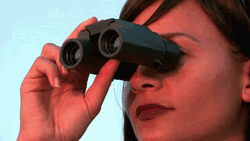 Erica De Casier Looking Thru Binoculars GIF