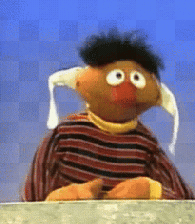 Ernie From Sesame Street in Striped Sweater and White Hat
