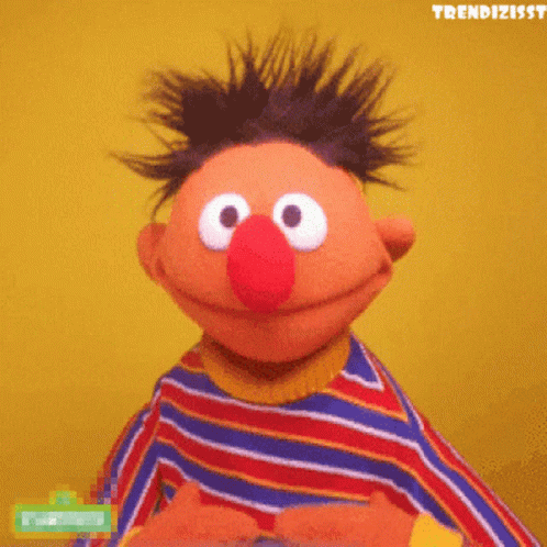 Ernie From Sesame Street Smiling In Striped Shirt GIF