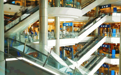 Escalator In Mall With B Sign GIF