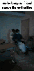 Escape Meme Pushing Wheelchair GIF
