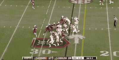 Espn Is Showing A Football Game Between Clemson And S. Carolina GIF