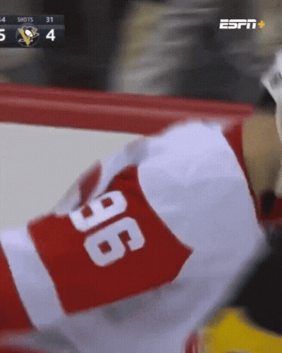 Espn Is Showing A Hockey Game Between The Penguins And The Red Jackets GIF