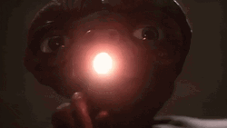 Et Has A Light On His Hands GIF