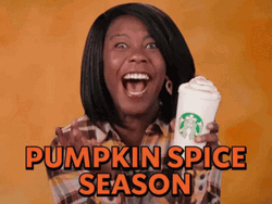 Excited Woman Holding Cup Of Psl GIF