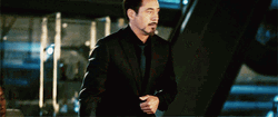 Exhausted Tony Stark Standing Up GIF