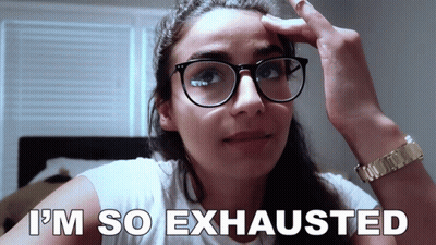 Exhausted Woman Wearing Glasses GIF