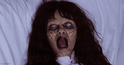 Exorcist Licking Tongue Gesture GIF
