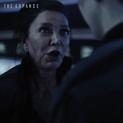 Expanse Ad Woman Talking To Man Says Focus And Get Me What I Need GIF