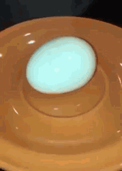 Explode Cutting Egg On Plate GIF