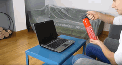Extinguishing A Laptop Computer GIF