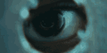 Eyeball Looking Through A Hole GIF
